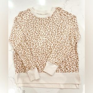 Women’s medium leopard sweatshirt.